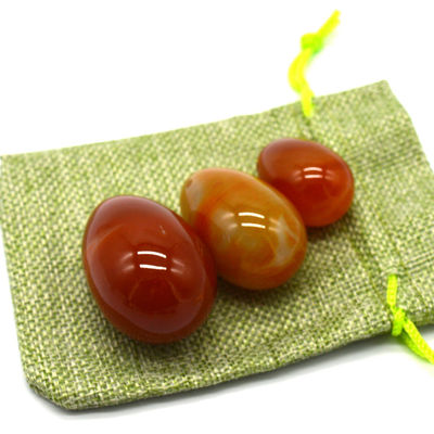 OEM ODM 받아 들인 적색 카넬리안 요니 달걀 반 귀석 달걀 뚫린 마사지 스타일