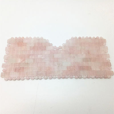 얼굴 및 눈 마사지 성능을위한 분홍색 쿼츠 얼굴 마스크