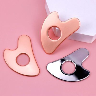 스테인레스 스틸 심장 모양 홀로 구아 샤 보드 금속 얼굴 미용 도구 전체 신체 마사지 영역 및 OEM / ODM