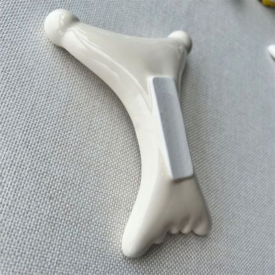 OEM/ODM X형 세라믹 구아 샤 스크래핑 마사저 미용실 얼굴 휴식을 위해 필수