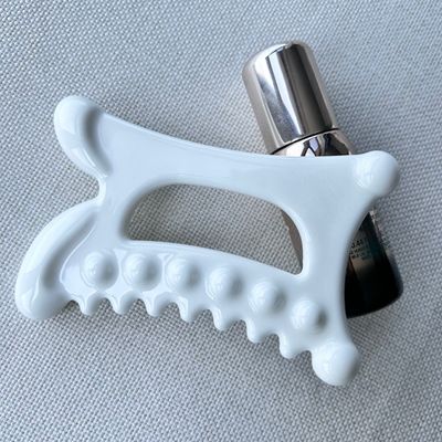 우리의 세라믹 구아샤 스크래핑 마사지 도구 의료 개인 관리 스타일로 림프절 배수기의 이점을 경험하십시오.